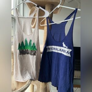 Two size small racerback tanks. Tree Hugger and Weirdlandia.